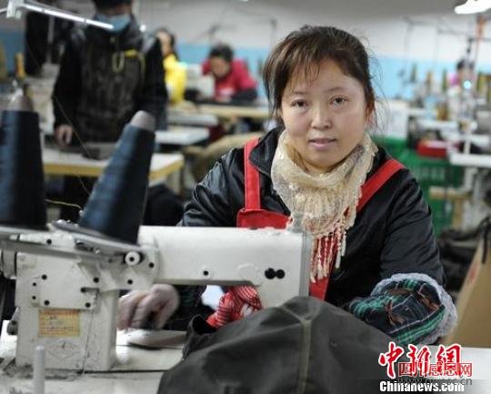 震灾区彭州家纺服装业兴起外出务工人员回乡